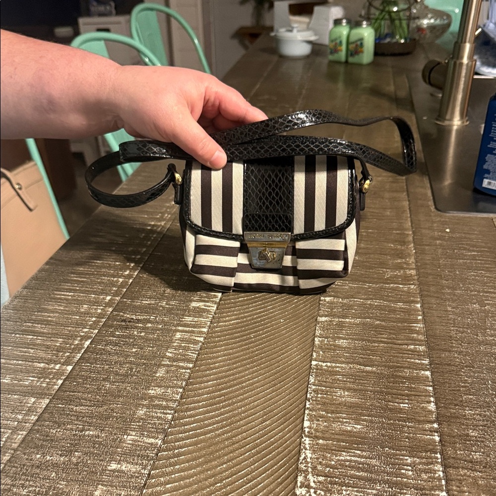 Chic Striped Crossbody Bag with Black Accents